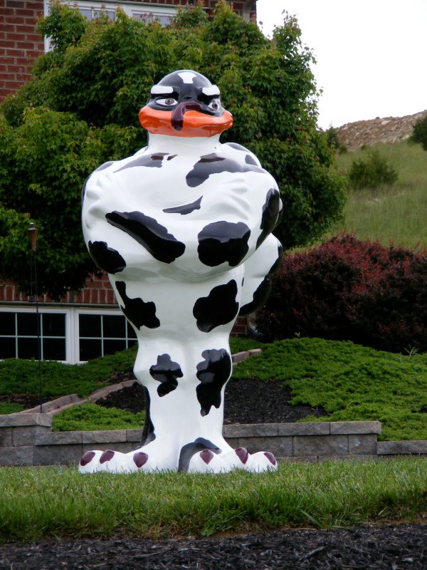 HokieBird Gobble-de-Art statute painted like a Holstein cow.